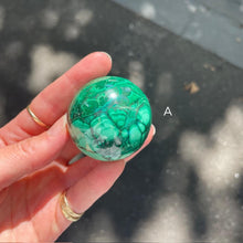 Load image into Gallery viewer, Malachite Spheres | Beautiful material from the Congo | Complex and fascinating swirls and rosettes | Pockets and caves sparkle with crystalline Malachite | Genuine Gems from Crystal Heart Melbourne Australia since 1986
