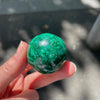 Malachite Spheres | Beautiful material from the Congo | Complex and fascinating swirls and rosettes | Pockets and caves sparkle with crystalline Malachite | Genuine Gems from Crystal Heart Melbourne Australia since 1986
