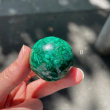 Load image into Gallery viewer, Malachite Spheres | Beautiful material from the Congo | Complex and fascinating swirls and rosettes | Pockets and caves sparkle with crystalline Malachite | Genuine Gems from Crystal Heart Melbourne Australia since 1986
