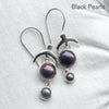 Freshwater Black Pearl Earrings  | 925 Sterling Silver | Large Round over smaller one | Fantastic iridescence | Topped by a soaring bird | Genuine Gems from Crystal Heart Melbourne Australia since 1986