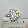 Peridot Pendant | Faceted Oval in Ornate Heart | 925 Sterling Silver|  Bezel Set | Open Back | Overcome nervous tension | Joyful Heart | Genuine gems from Crystal Heart Melbourne Australia since 1986