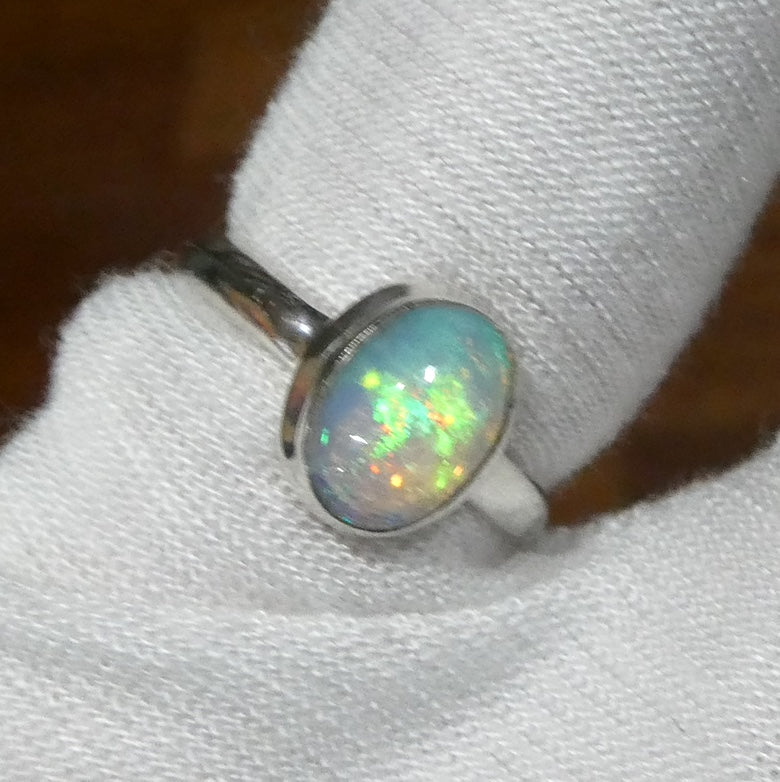 Ethiopian Opal Gemstone Ring | Large Solid Oval Cabochon  | Very Lively Display of Colours | Bright Reds, Oranges and Greens |  US Size 10 | AUS Size T1/2  Genuine Gemstones from  Crystal Heart Australia since 1986