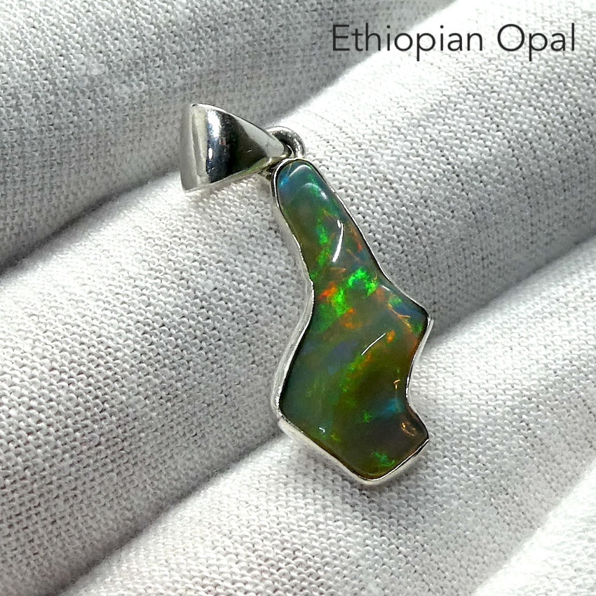 Ethiopian Solid Opal Pendant | Freeform Polished Rough | Green & Red Flash | 925 Silver | Genuine Gems from Crystal Heart Australia since 1986