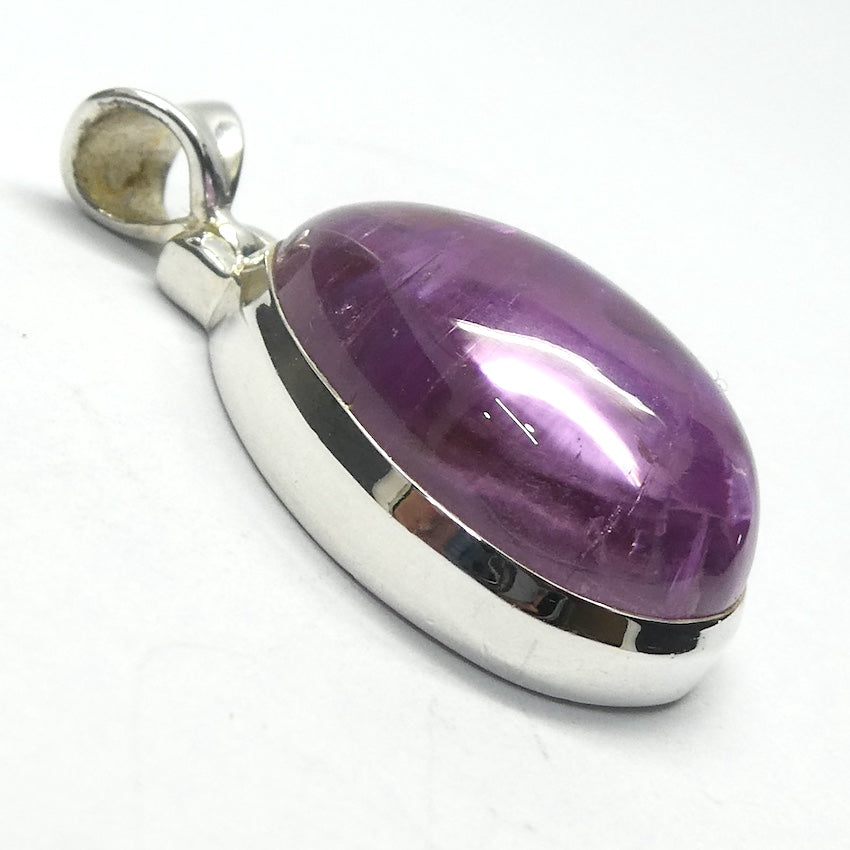 Kunzite Pendant | Teardrop Cabochon | Good colour Translucency | 925 Sterling Silver | Bezel Set | Wisdom of the Heart | Taurus Scorpio Leo | Genuine Gems from Crystal heart Melbourne Australia since 1986  