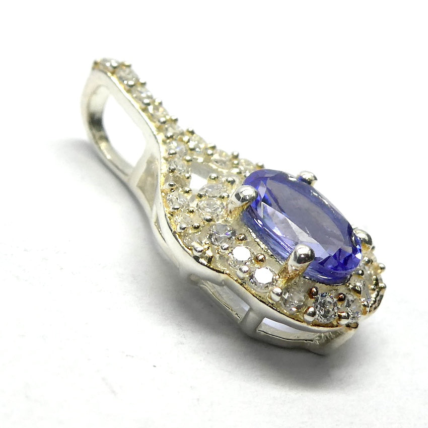 Tanzanite Gemstone Pendant  | Faceted Oval | AAA Grade | Natural Stone |
Art Deco Design | surrounded by diamond like CZ | 925 Sterling Silver | Rich violet Blue | Achieve your spiritual potential  | Genuine Gems from Crystal Heart Melbourne since 1986