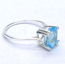 Load image into Gallery viewer, Blue Topaz Ring | Faceted Oval | Beautiful flawless Blue | Bright 925 Sterling Silver | Solid Claw setting | Open Backs | US Size | US Ring Size 9 | Genuine Gems from Crystal Heart Melbourne Australia since 1986