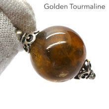 Load image into Gallery viewer, Golden Tourmaline Pendant | 14 mm bead | 925 Sterling Silver  | Oxidised ethnic caps | Genuine Gems from Crystal Heart Melbourne Australia since 1986