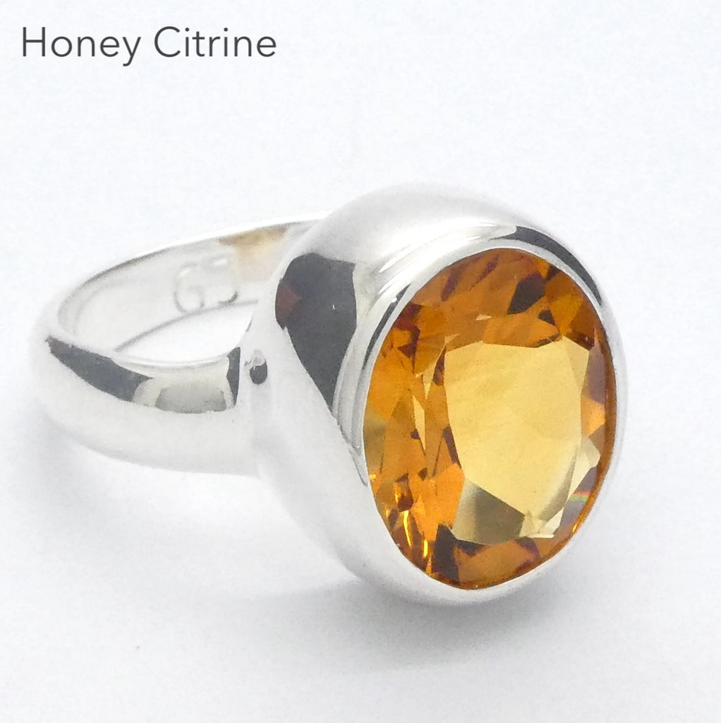 Superb AAA Grade Flawless Citrine with a beautiful deep honey colour. Faceted into an Oval shape. The main pic is in daylight which gives the truest rendition as the light box tends to wash the colour out a bit. This beautiful mellow shade is indicative of Natural Citrine rather than heated Amethyst.